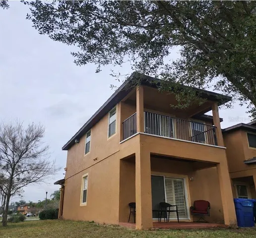 a house view with a outdoor space