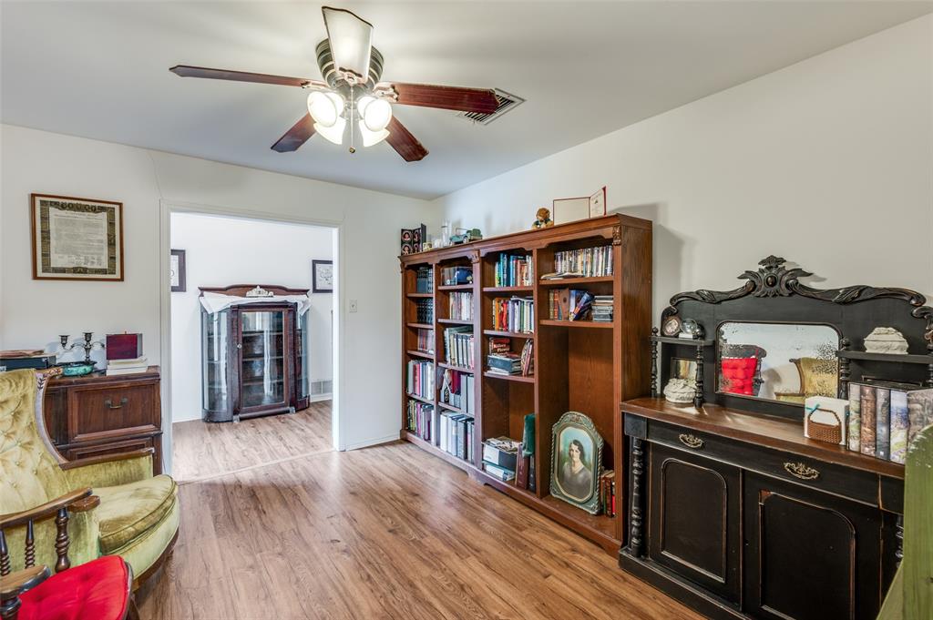1509 Springbrook Street Corinth, TX 76210 - Photo 10 of 24 a view of a workspace with furniture and toys