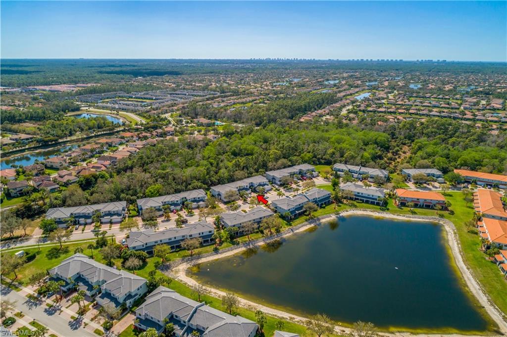 15186 Summit Pl Circle Naples, FL 34119 - Photo 11 of 37 an aerial view of a city with ocean view