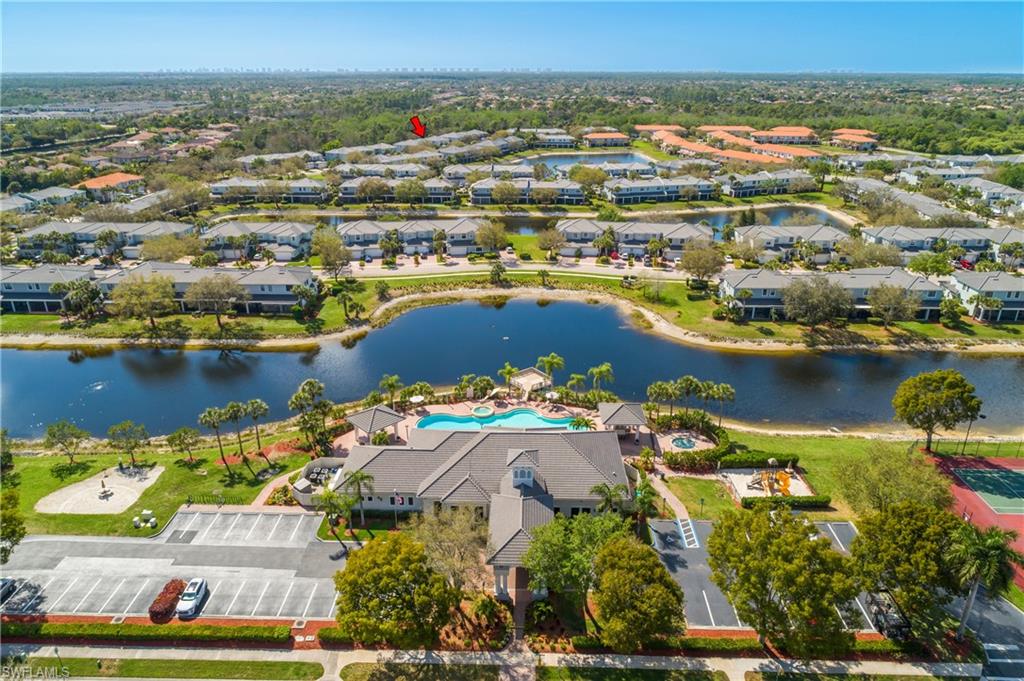 15186 Summit Pl Circle Naples, FL 34119 - Photo 17 of 37 an aerial view of residential houses with outdoor space