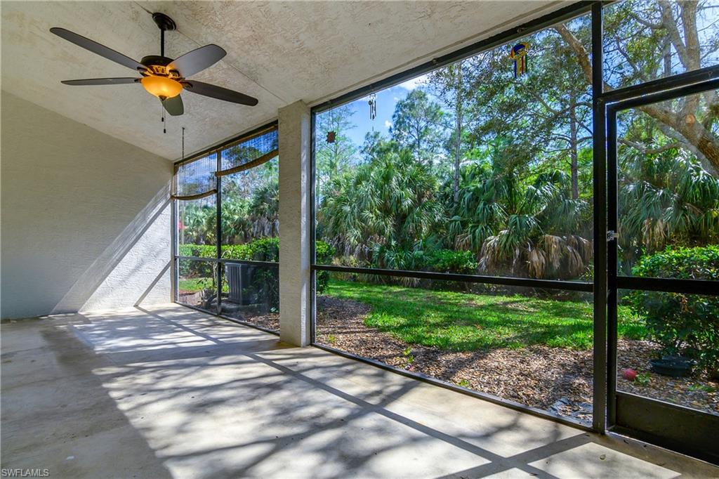 15186 Summit Pl Circle Naples, FL 34119 - Photo 10 of 37 Unfurnished sunroom with ceiling fan