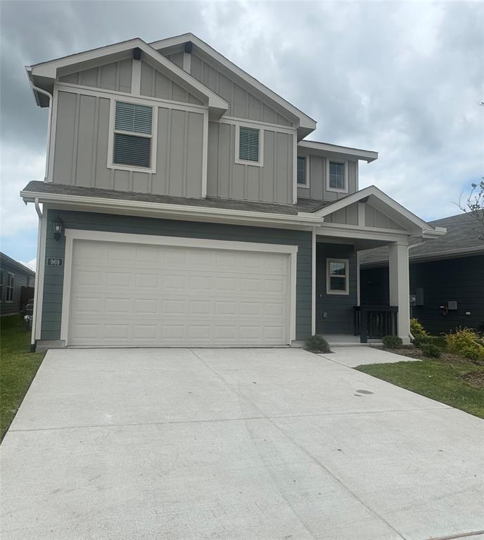 969 Summer Drive Lavon, TX 75166 - Photo 1 of 1 a front view of a house with a yard and garage