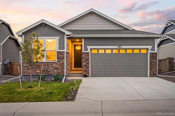 a front view of house with garage