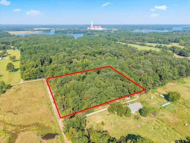 a view of a pool and an outdoor space