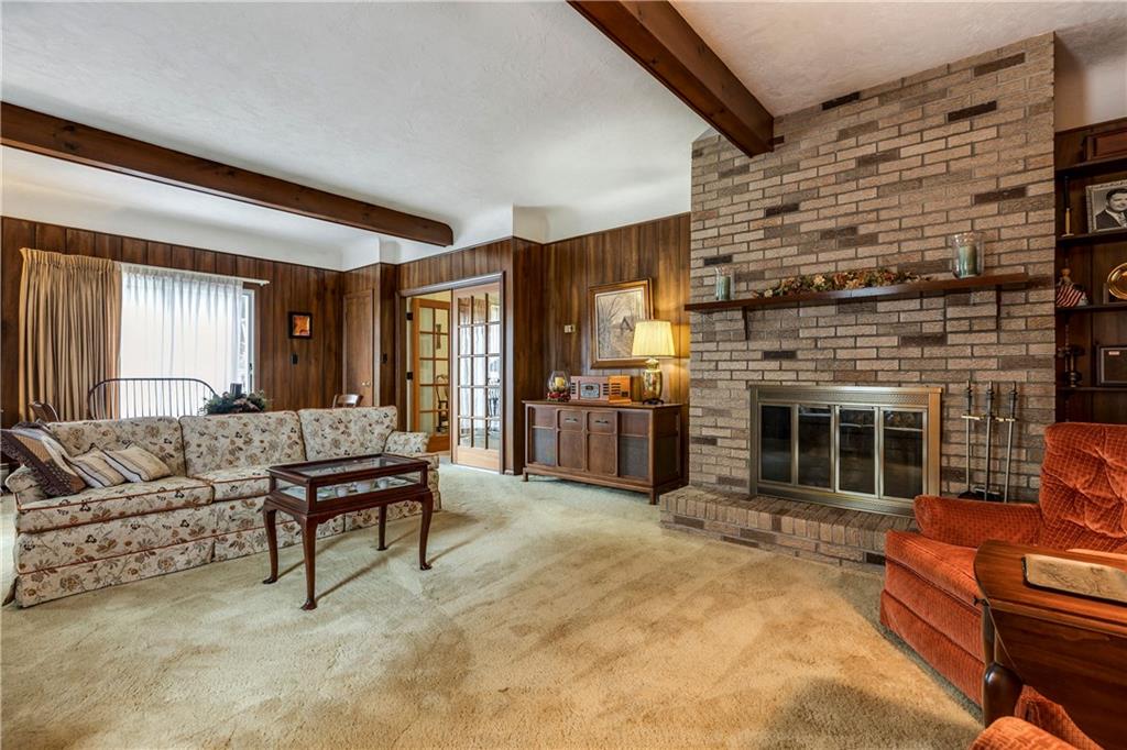 3761 Bakerstown Road Gibsonia, PA 15044 - Photo 10 of 15 SPACIOUS family room with gas fireplace and additional smaller deck leading to back yard