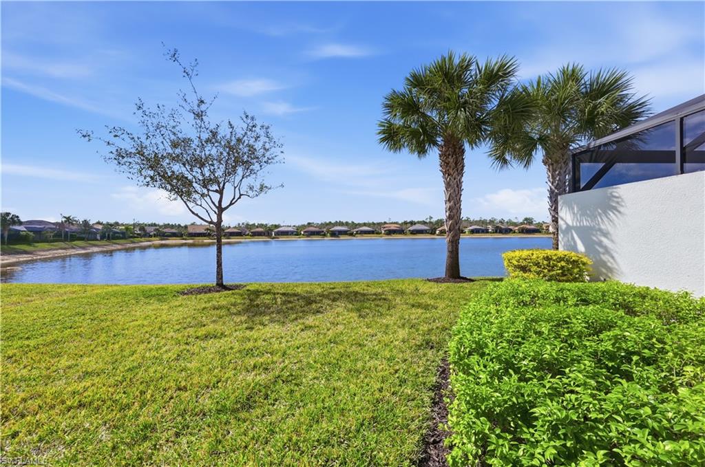 7733 Jacaranda Lane Naples, FL 34114 - Photo 25 of 38 a view of a yard with an ocean