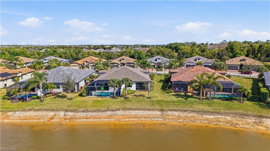 7733 Jacaranda Lane Naples, FL 34114 - Photo 29 of 38 a view of a town with big houses