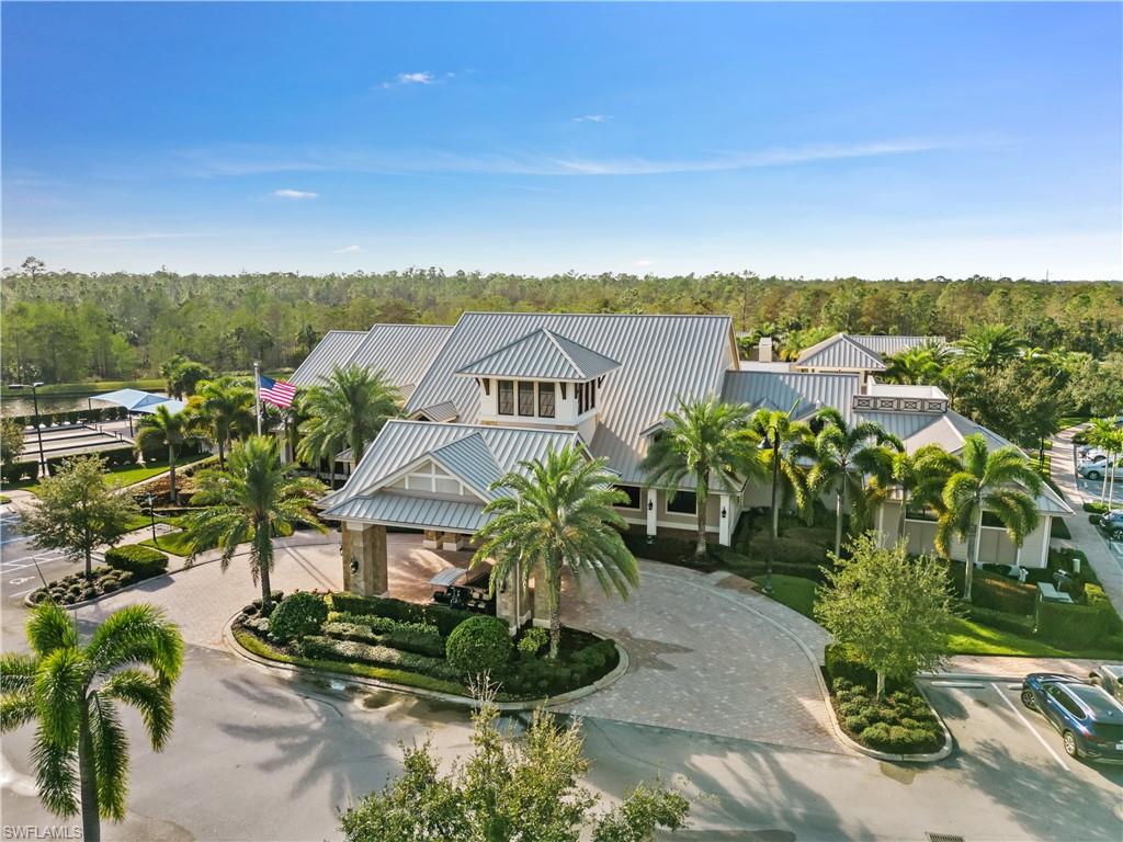 7733 Jacaranda Lane Naples, FL 34114 - Photo 33 of 38 a view of a lake with a yard