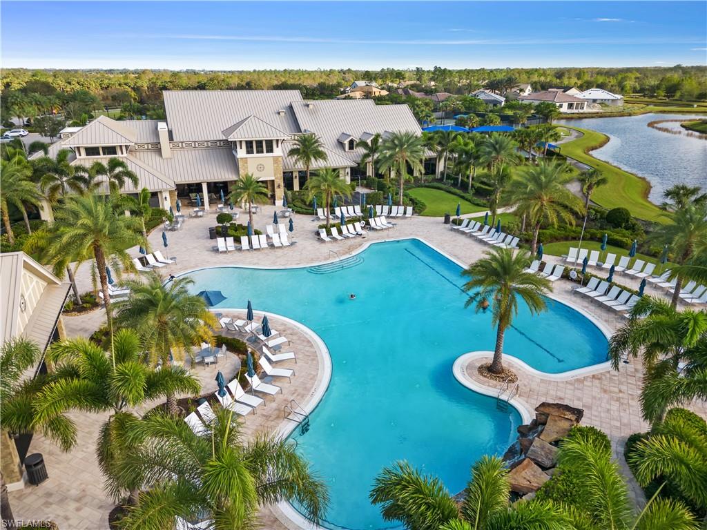 7733 Jacaranda Lane Naples, FL 34114 - Photo 38 of 38 an aerial view of residential houses with outdoor space and swimming pool