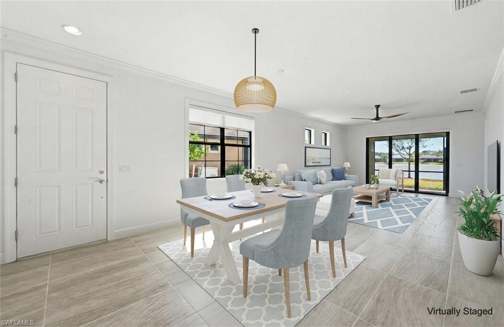 7733 Jacaranda Lane Naples, FL 34114 - Photo 6 of 38 a view of a dining room with furniture and window