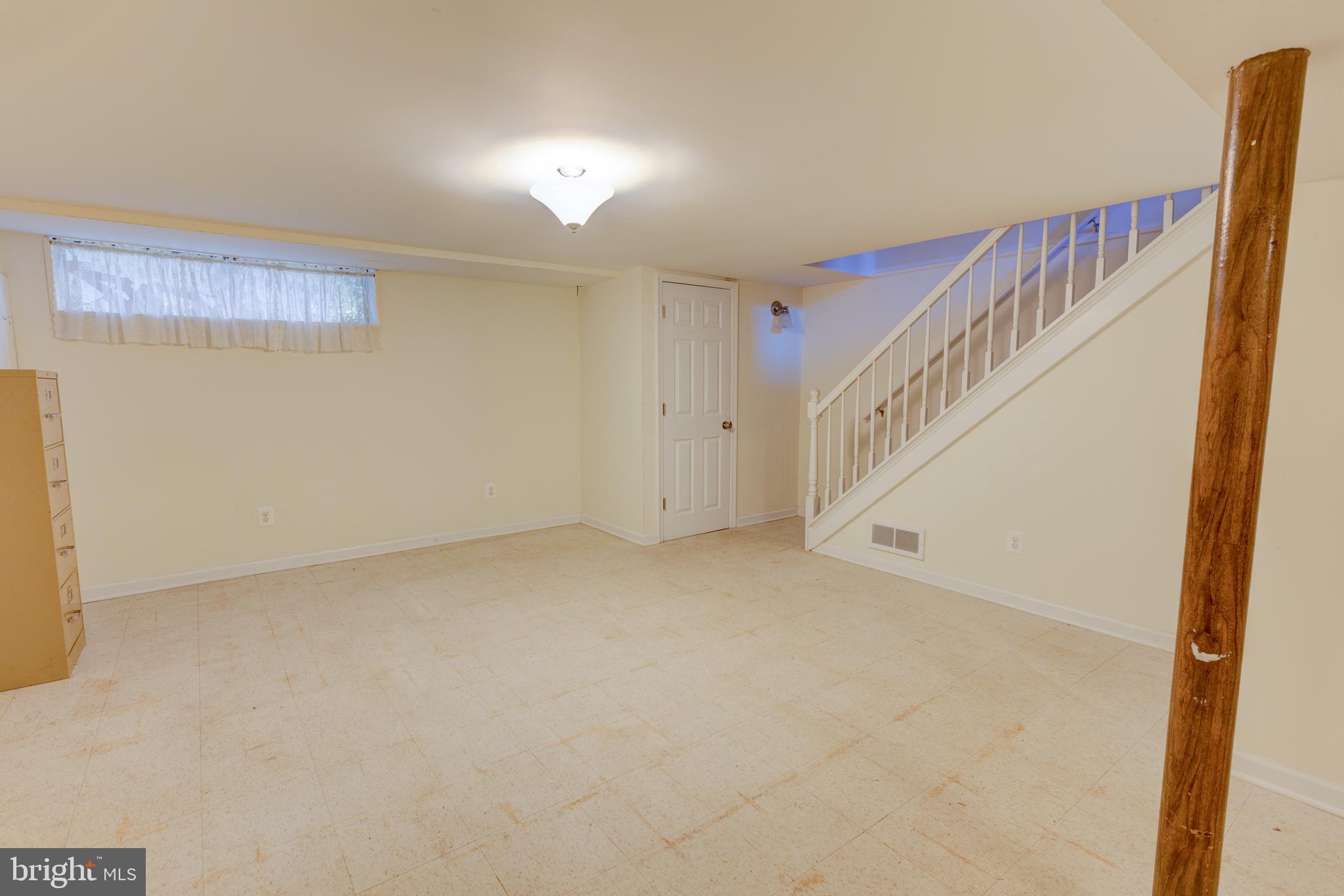 1909 Winford Road Baltimore, MD 21239 - Photo 18 of 21 Flush at the bottom of the steps