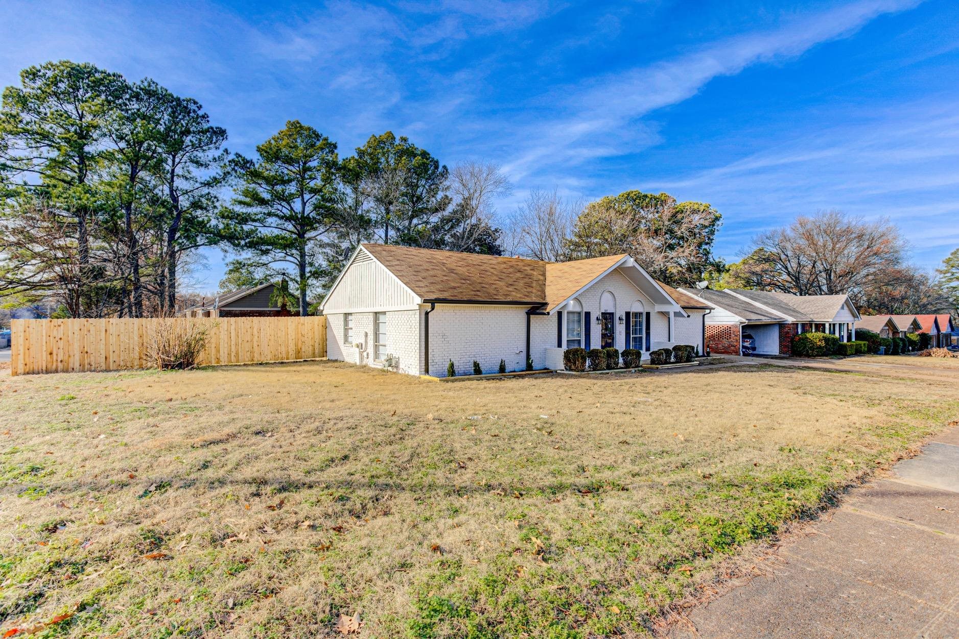 3187 Belle Tower Road Memphis, TN 38115 - Photo 2 of 24 View of front of home featuring brick siding and roof with shingles