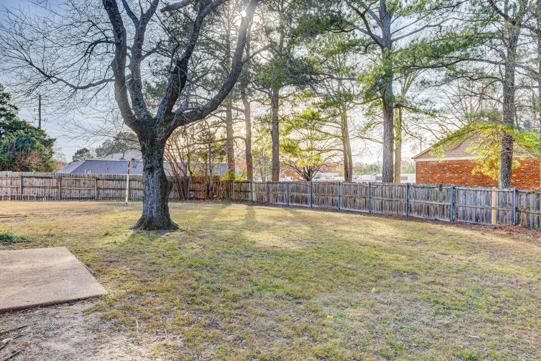 3187 Belle Tower Road Memphis, TN 38115 - Photo 22 of 24 View of fenced backyard