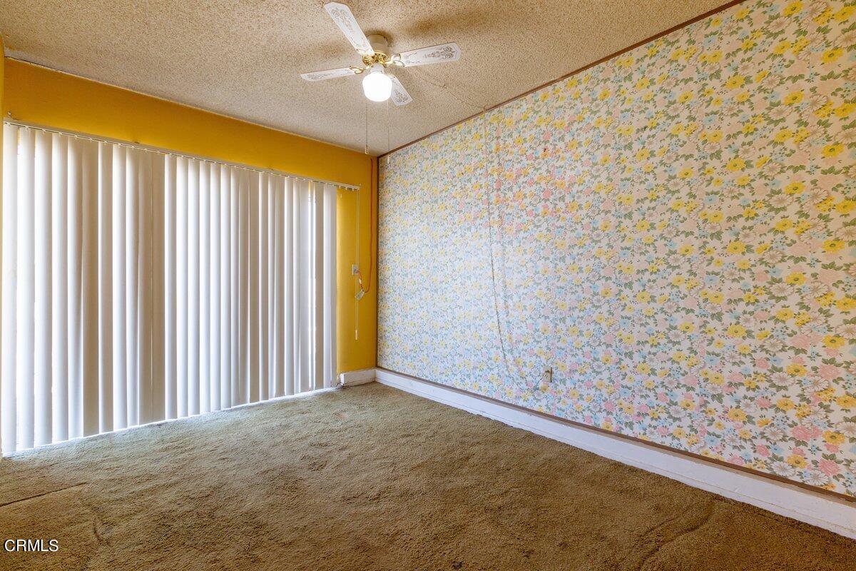 1931 Ukiah Street Oxnard, CA 93035 - Photo 11 of 21 a view of a livingroom with an empty space and a ceiling fan