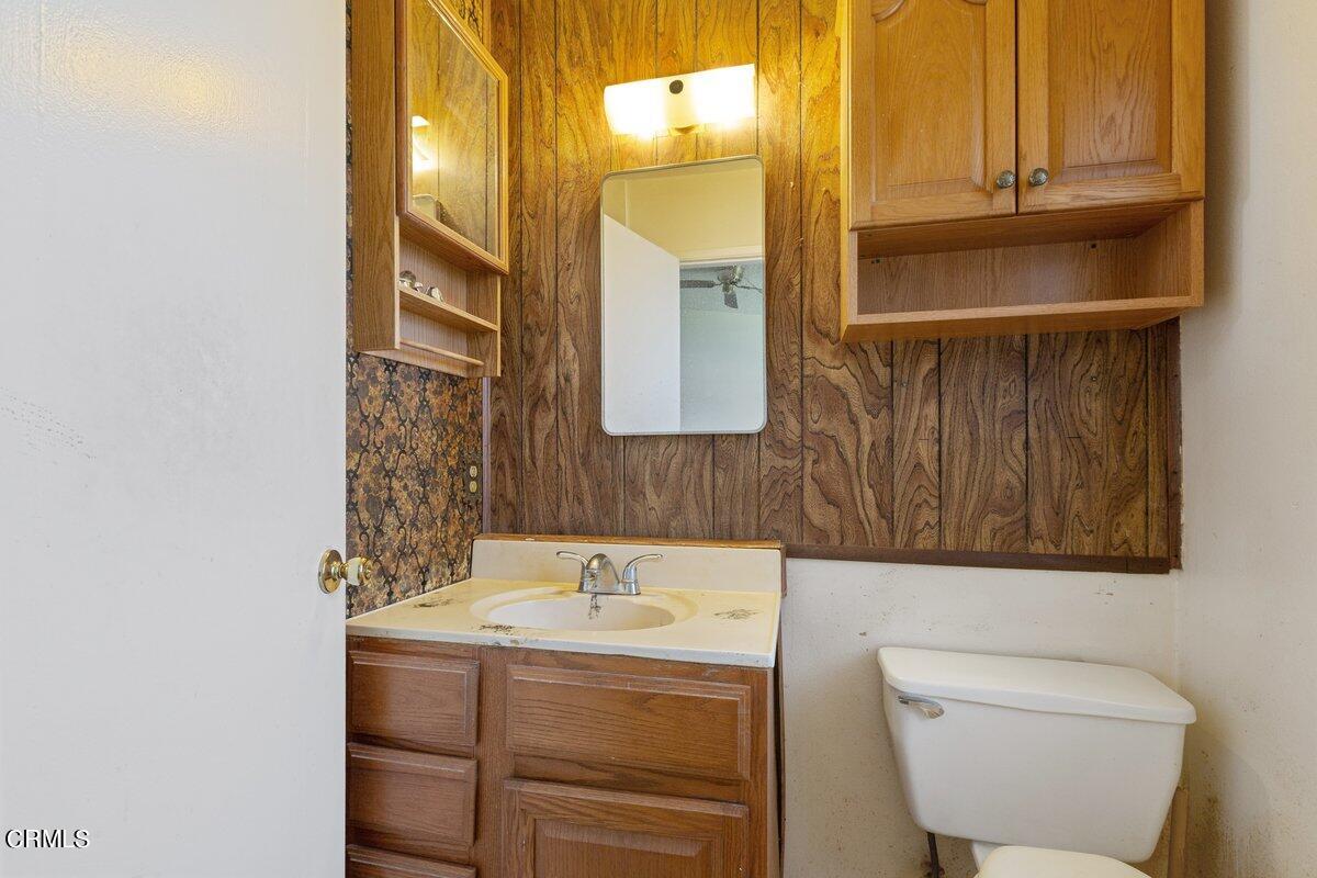 1931 Ukiah Street Oxnard, CA 93035 - Photo 17 of 21 a bathroom with a sink and a mirror
