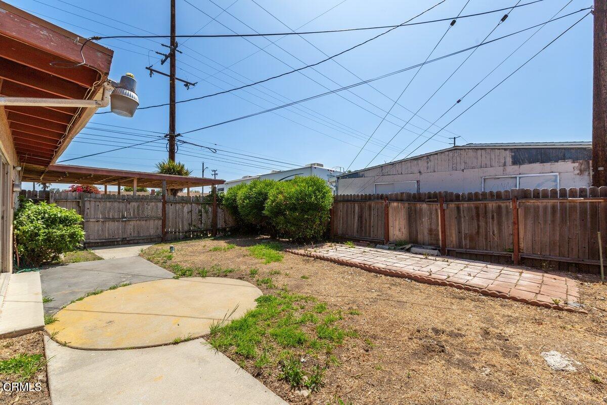 1931 Ukiah Street Oxnard, CA 93035 - Photo 20 of 21 a backyard of a house with wooden fence