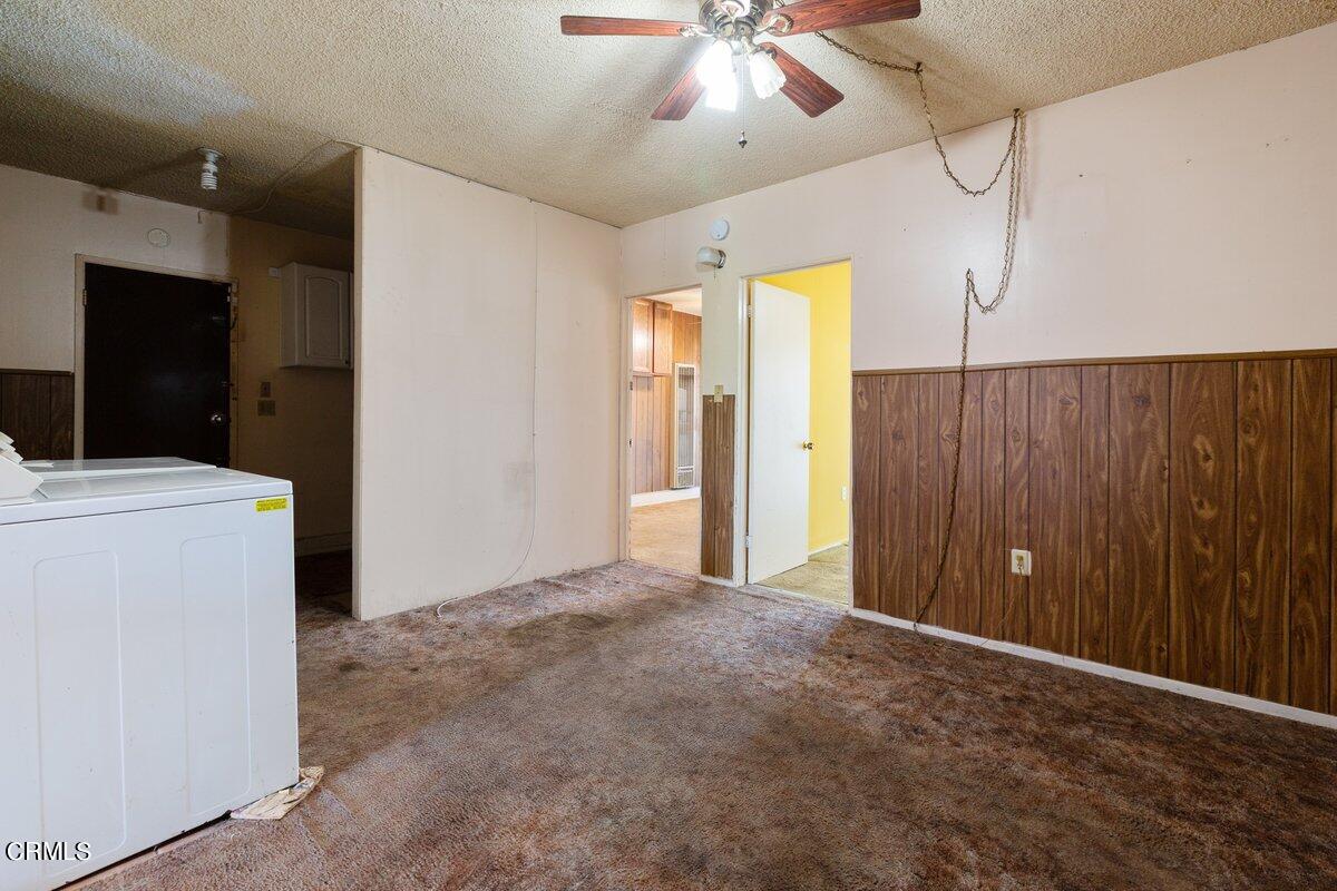 1931 Ukiah Street Oxnard, CA 93035 - Photo 10 of 21 a view of a livingroom with furniture and chandelier fan