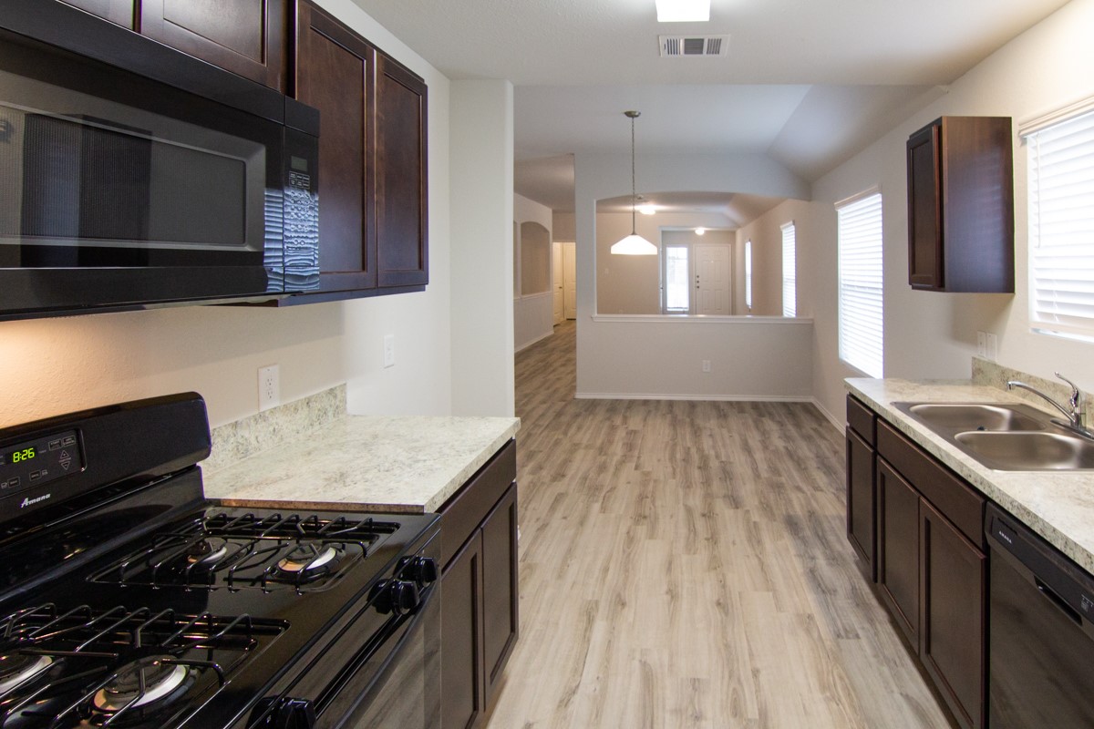 910 Dancing Sun Court Baytown, TX 77521 - Photo 2 of 10 Photos may be representative of the floor plan and not the exact home. Finishes, layout, and features of the actual property for lease may vary.