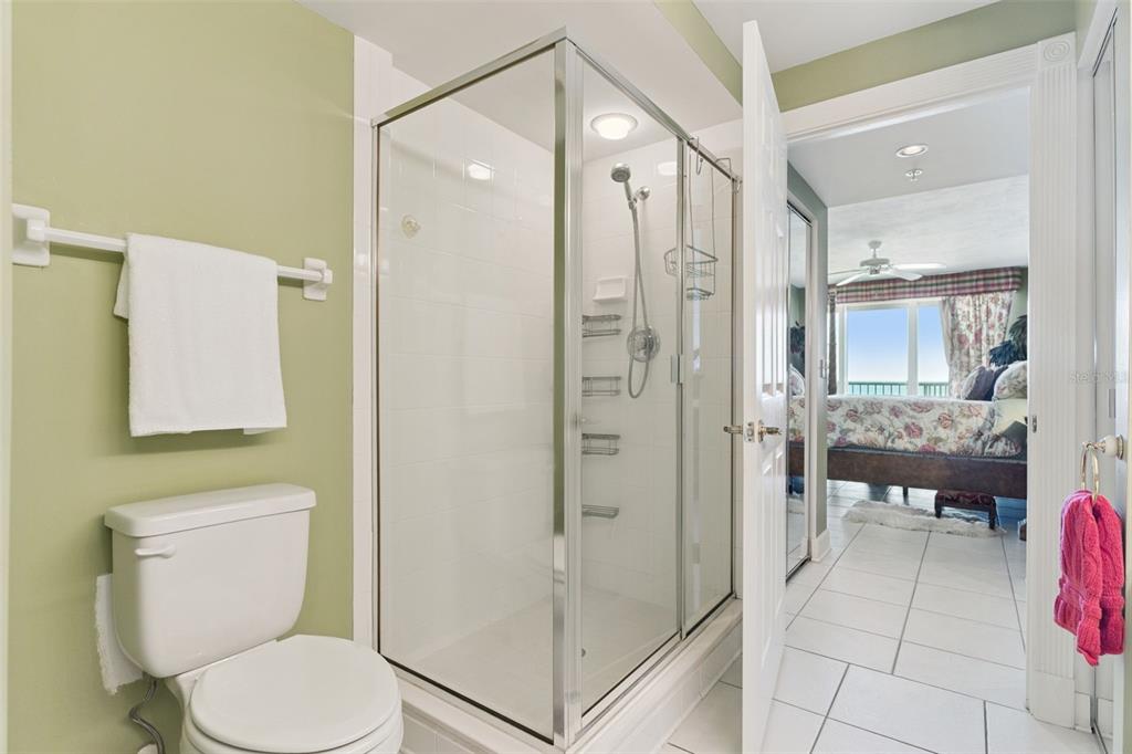 4621 South Atlantic Avenue, Unit 7506 Ponce Inlet, FL 32127 - Photo 29 of 46 a bathroom with a toilet a sink and a shower