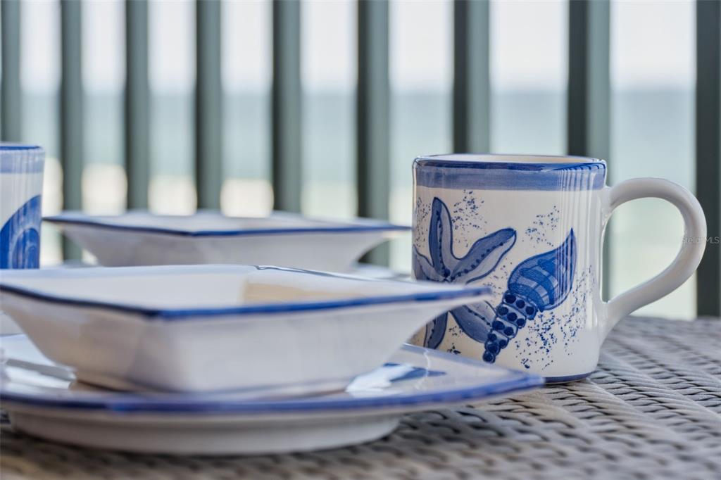 4621 South Atlantic Avenue, Unit 7506 Ponce Inlet, FL 32127 - Photo 35 of 46 a view of a dining room with furniture and a fireplace