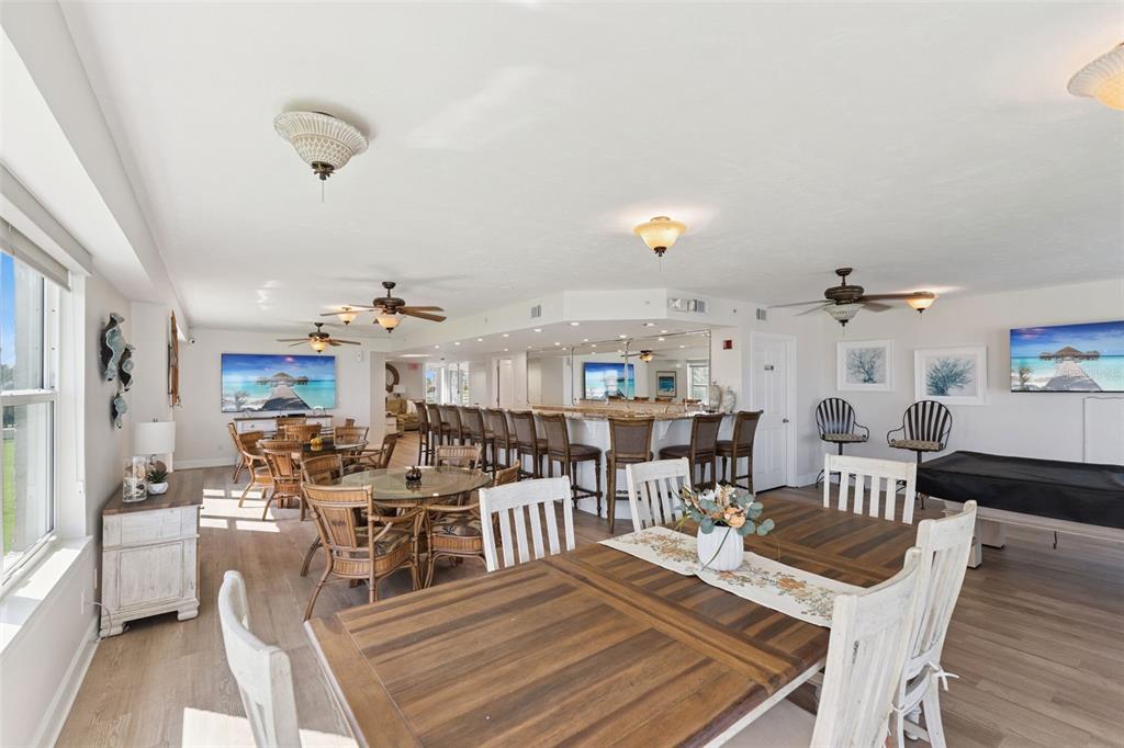 4621 South Atlantic Avenue, Unit 7506 Ponce Inlet, FL 32127 - Photo 39 of 46 a living room with lots of furniture and view of kitchen