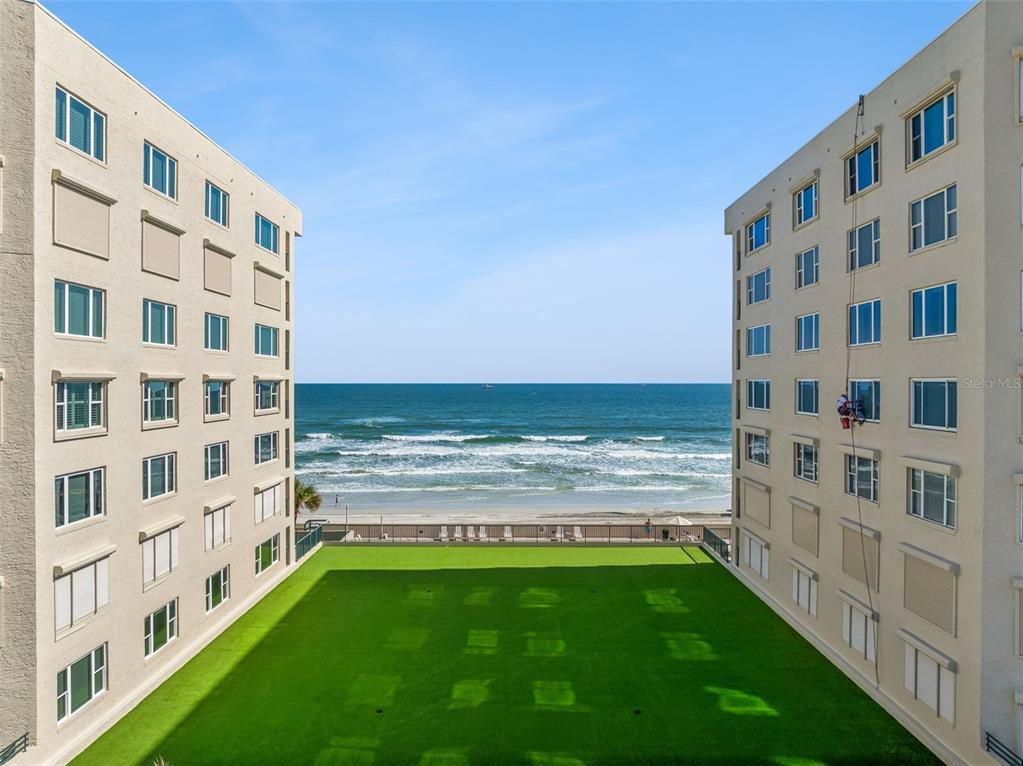 4621 South Atlantic Avenue, Unit 7506 Ponce Inlet, FL 32127 - Photo 41 of 46 a view of building with ocean view
