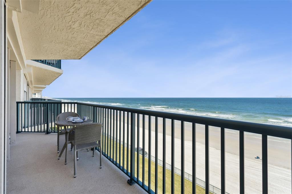 4621 South Atlantic Avenue, Unit 7506 Ponce Inlet, FL 32127 - Photo 5 of 46 a balcony with outdoor seating