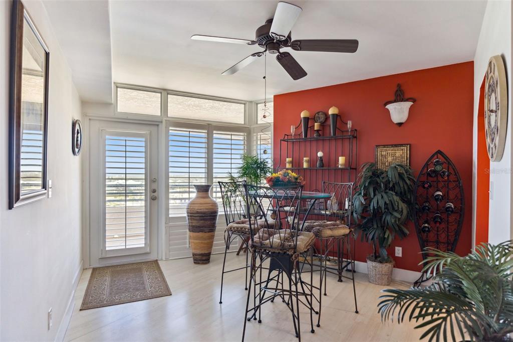 4621 South Atlantic Avenue, Unit 7506 Ponce Inlet, FL 32127 - Photo 7 of 46 a view of a livingroom with furniture and a potted plant