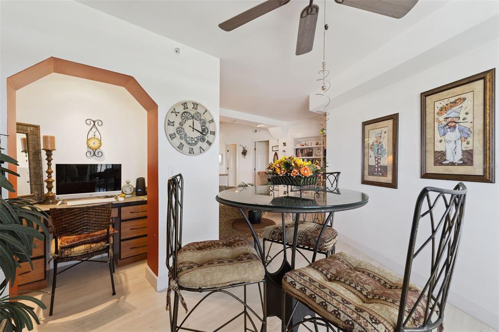 4621 South Atlantic Avenue, Unit 7506 Ponce Inlet, FL 32127 - Photo 8 of 46 a view of a livingroom with furniture and a flat screen tv