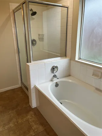 a bathroom with a bathtub