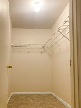 a bathroom with a toilet and a bathtub