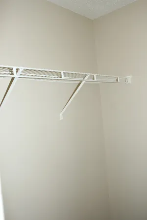 a view of a room with racks on the wall