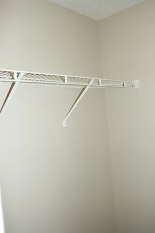 a view of a room with racks on the wall