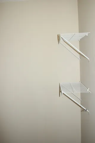 a close up view of racks on the wall