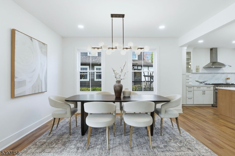 8 Mountainview Road Millburn, NJ 07041 - Photo 11 of 46 a view of a dining room with furniture window and wooden floor