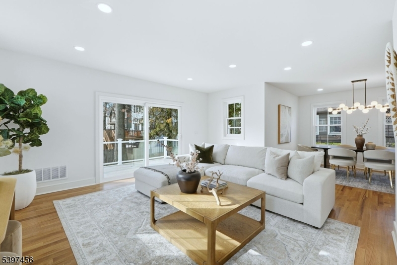 8 Mountainview Road Millburn, NJ 07041 - Photo 13 of 46 a living room with furniture and a large window