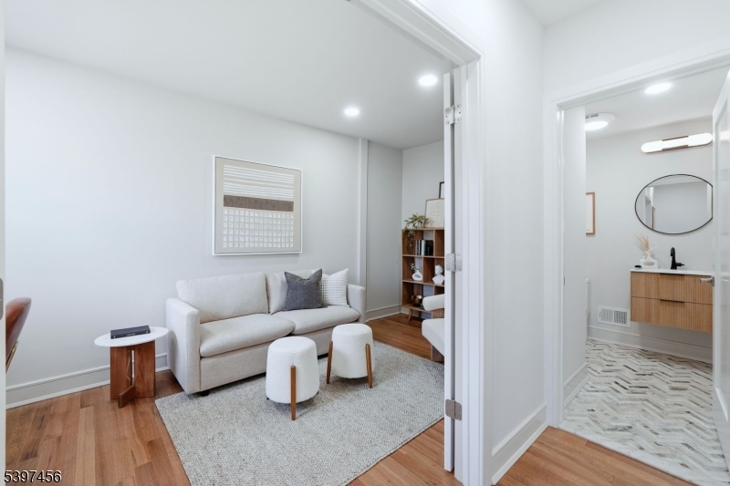 8 Mountainview Road Millburn, NJ 07041 - Photo 15 of 46 a living room with furniture and a window