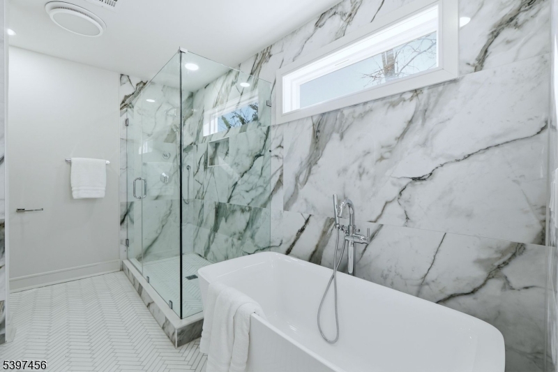 8 Mountainview Road Millburn, NJ 07041 - Photo 24 of 46 a bathroom with a sink and shower