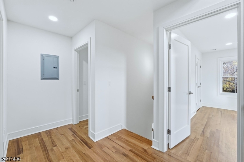 8 Mountainview Road Millburn, NJ 07041 - Photo 25 of 46 a view of hallway with wooden floor