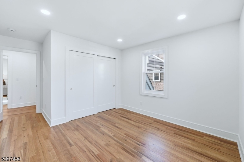 8 Mountainview Road Millburn, NJ 07041 - Photo 27 of 46 a view of empty room with wooden floor