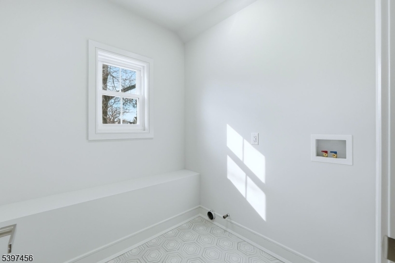 8 Mountainview Road Millburn, NJ 07041 - Photo 32 of 46 a view of an empty room with a window