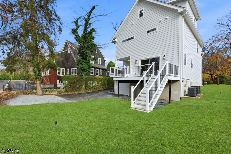 8 Mountainview Road Millburn, NJ 07041 - Photo 37 of 46 a view of a house with a yard