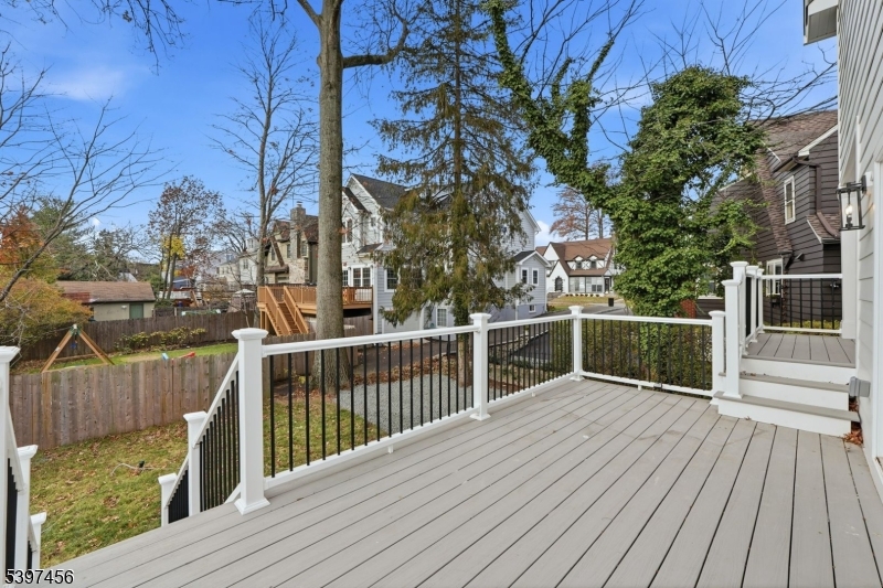 8 Mountainview Road Millburn, NJ 07041 - Photo 38 of 46 a view of balcony with deck and wooden floor