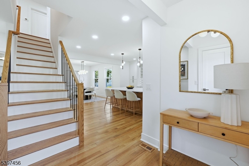 8 Mountainview Road Millburn, NJ 07041 - Photo 4 of 46 a living room with furniture and wooden floor