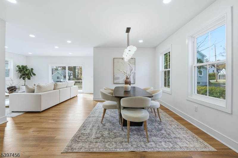 8 Mountainview Road Millburn, NJ 07041 - Photo 9 of 46 a living room with furniture and a large window