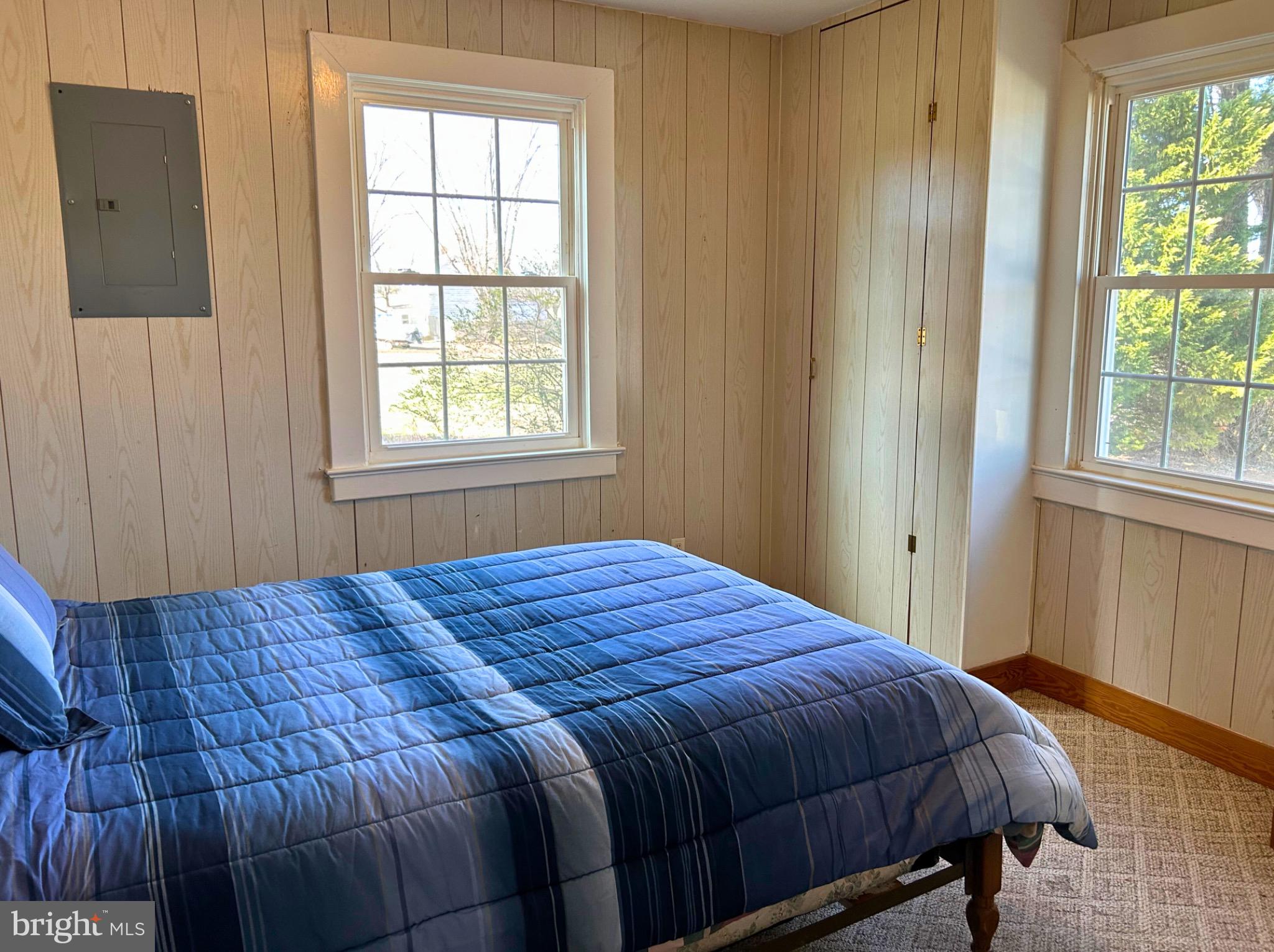 383 Lake Road Lottsburg, VA 22511 - Photo 4 of 18 a bedroom with a bed and a window