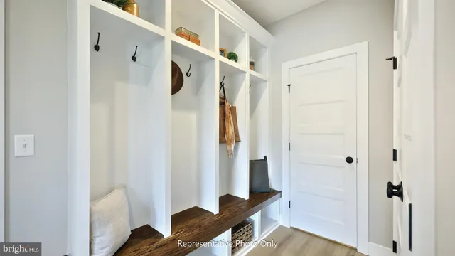 a view of entryway with wooden floor