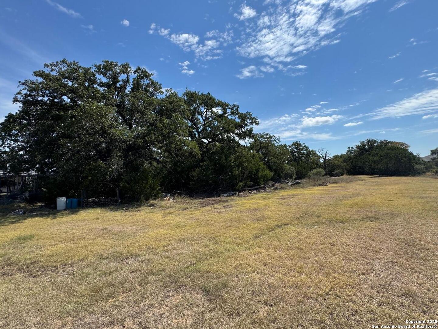 2110 Phantom Rider Trail Spring Branch, TX 78070 - Photo 3 of 11 a view of an outdoor space and a yard