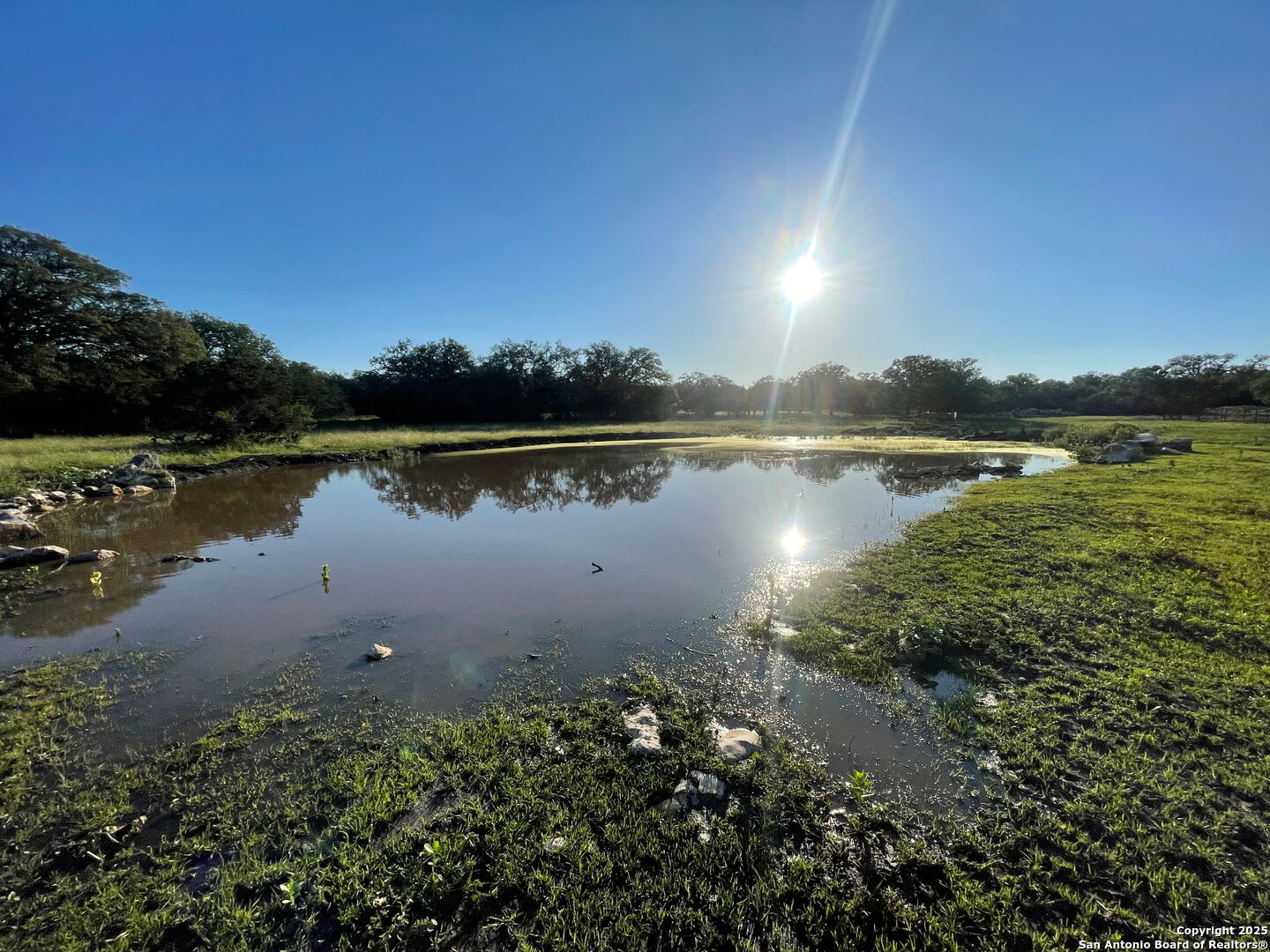2110 Phantom Rider Trail Spring Branch, TX 78070 - Photo 6 of 11 a view of a lake next to a lake with houses
