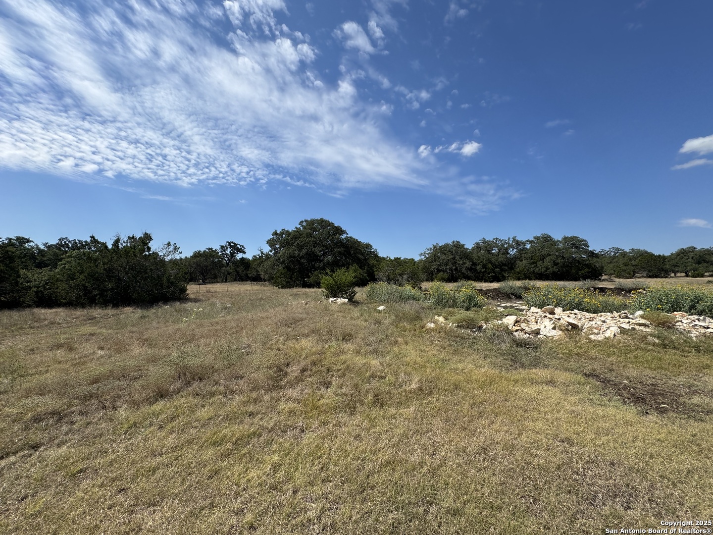 2110 Phantom Rider Trail Spring Branch, TX 78070 - Photo 7 of 11 a view of a lake with houses in the back